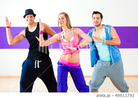 Dancer at Zumba fitness training in dance studio Dancer at Zumba fitness training in dance studio 40011792