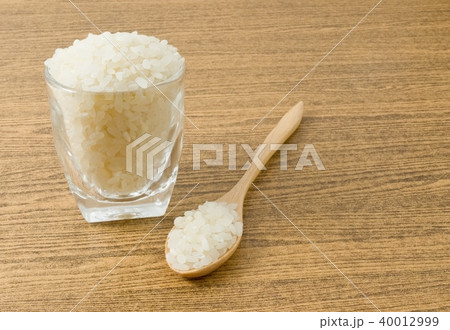 Japanese Rice in Wooden Spoon and Glass Japanese Rice in Wooden Spoon and Glass 40012999