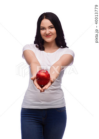 beautiful brunette woman holding red apple beautiful brunette woman holding red apple 40013779