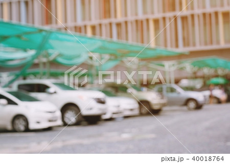 Cars parked in the parking lot.Open space area Cars parked in the parking lot.Open space area 40018764