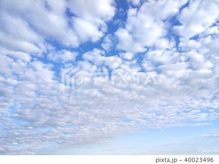 Blue sky background with clouds 40023496