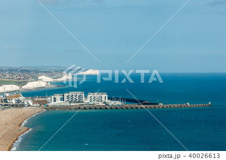 Aerial view of sunny summer Brighton, coastline, Seven Sisters on the horizon Aerial view of sunny summer Brighton, coastline, Seven Sisters on the horizon 40026613