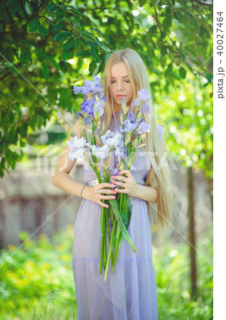 Attractive young girl with blonde hair Attractive young girl with blonde hair 40027464