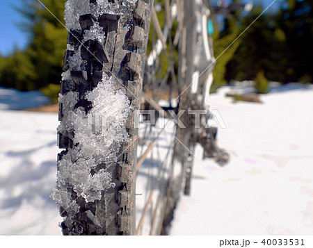 Bike in snow.Cycling on large tire wheels in snow Bike in snow.Cycling on large tire wheels in snow 40033531