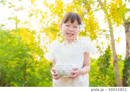 girl wearing Thai traditional dress and smiles 40033852