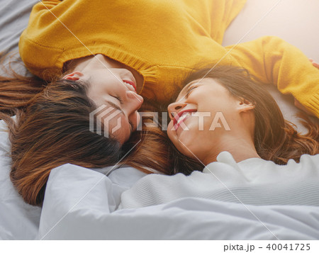 Young asian woman lesbian couple smiling. Young asian woman lesbian couple smiling. 40041725