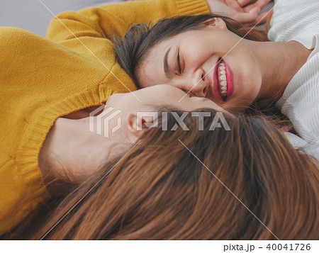 Young asian woman lesbian couple smiling. Young asian woman lesbian couple smiling. 40041726