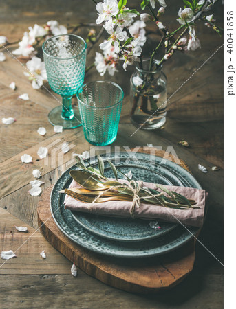 Spring Easter Table setting over vintage wooden background Spring Easter Table setting over vintage wooden background 40041858