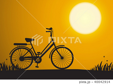 Silhouette of bicycle during sunrise in the park 40042914