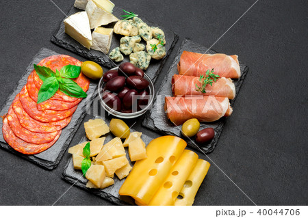 various type of italian meal or snack - cheese, sausage, olives and parma various type of italian meal or snack - cheese, sausage, olives and parma 40044706