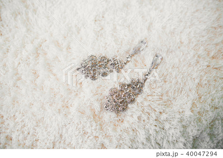 Luxury wedding jewelry for bride. Preparing in the morning Luxury wedding jewelry for bride. Preparing in the morning 40047294