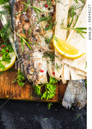Healthy and diet grilled fish in herbs Healthy and diet grilled fish in herbs 40048127