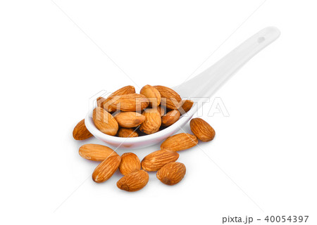 almonds seeds in the white spoon isolated on white almonds seeds in the white spoon isolated on white 40054397