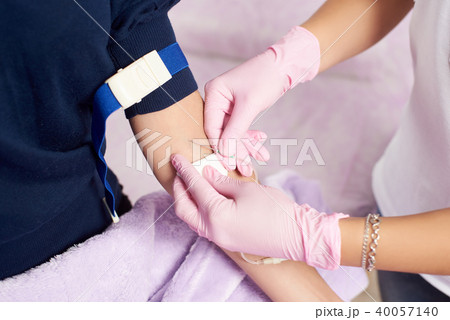 Taking blood from a vein in cosmetology. Close-up 40057140
