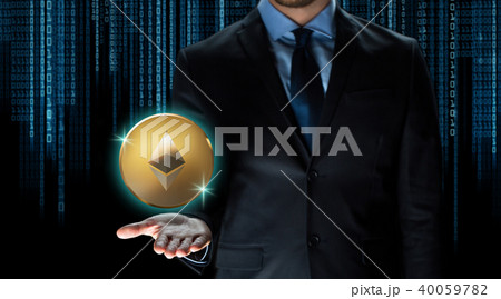 businessman with ethereum coin over binary code businessman with ethereum coin over binary code 40059782
