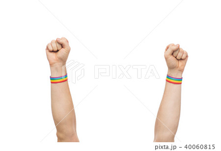 hands with gay pride rainbow wristbands shows fist hands with gay pride rainbow wristbands shows fist 40060815