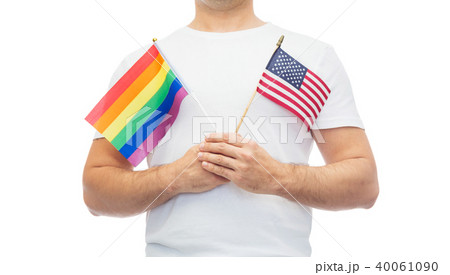 man with gay pride rainbow and american flag man with gay pride rainbow and american flag 40061090