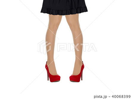 female legs wearing high heels isolated female legs wearing high heels isolated 40068399