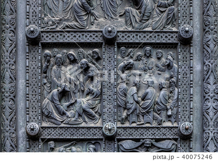 Fragment of Bremen's Cathedral Metalic Door with religious decorations 40075246