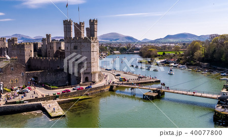 Aerial view of the historic castle Caernafon, Gwynedd in Wales - United Kingdom Aerial view of the historic castle Caernafon, Gwynedd in Wales - United Kingdom 40077800