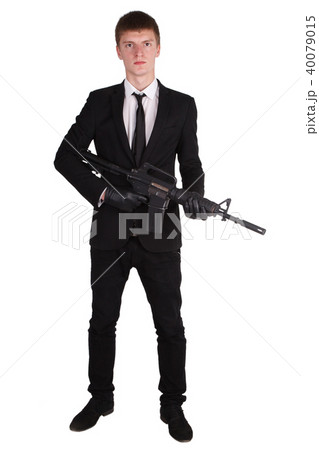 man in black costume and rifle man in black costume and rifle 40079015