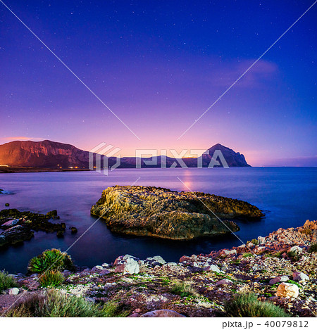The starry sky above rocky mountains. The starry sky above rocky mountains. 40079812