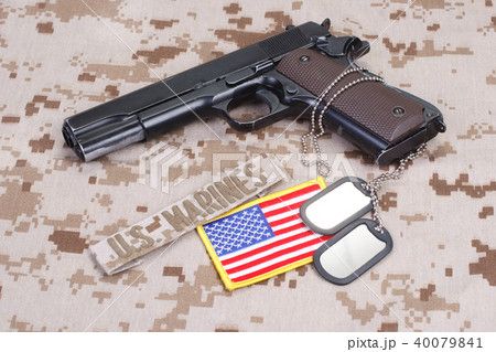 colt 1911 handgun on USMC camouflage uniform 40079841