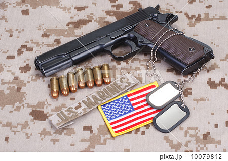 colt 1911 handgun on USMC camouflage uniform 40079842
