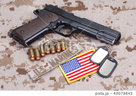 colt 1911 handgun on USMC camouflage uniform 40079843