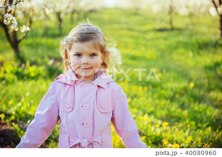 The little girl that runs in spring sunny day. Art processing an 40080960