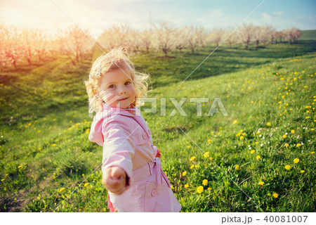 child playing on  sunny spring day. Toning effect. 40081007