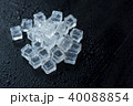 ice cubes reflection on black table background. 40088854