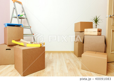 Photo of cardboard boxes, ladders, pizza Photo of cardboard boxes, ladders, pizza 40091083