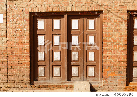 Wooden carved doors of an old house, Nepal 40095290