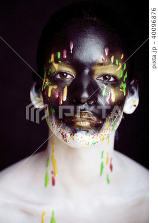woman with creative makeup closeup like drops of colors, facepai woman with creative makeup closeup like drops of colors, facepai 40096876