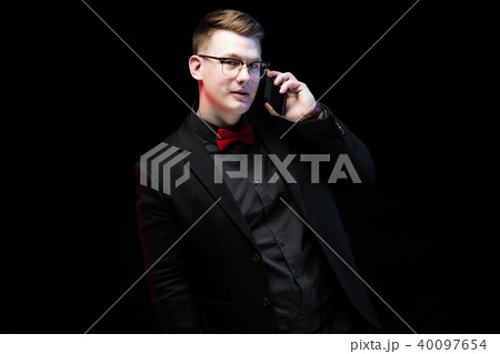 Portrait of confident handsome ambitious happy elegant responsible businessman talking on phone on Portrait of confident handsome ambitious happy elegant responsible businessman talking on phone on 40097654