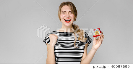 Excited woman with gift box 40097699