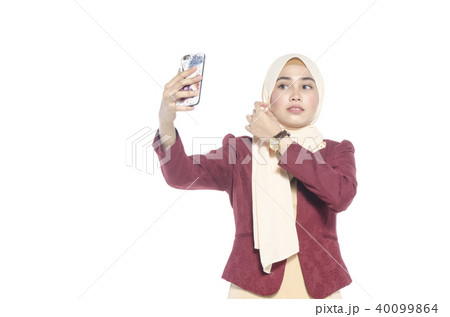 young attractive lady selfie photo on smartphone 40099864