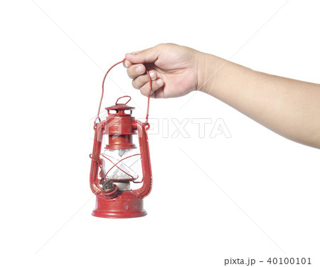 Hand holding red kerosene lantern lamp Hand holding red kerosene lantern lamp 40100101