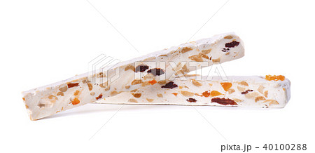 Nut nougat with dried fruit, sweet candy isolated on white background Nut nougat with dried fruit, sweet candy isolated on white background 40100288