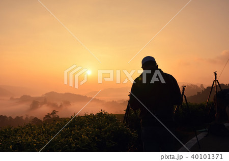 silhouette of man standing over sunrise background 40101371