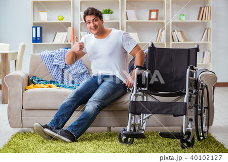 Disabled man recovering at home 40102127