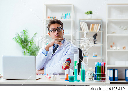 Funny doctor having fun in hospital lab 40103819