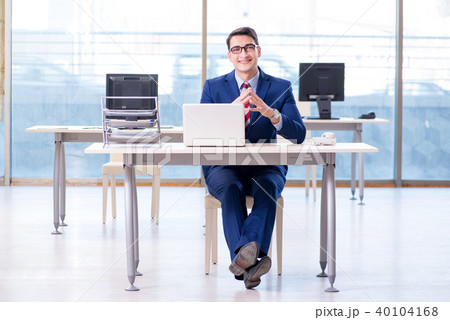 Young handsome businessman employee working in office at desk 40104168