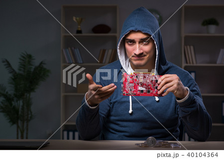 Young man in bitcoin mining concept Young man in bitcoin mining concept 40104364