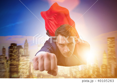 Flying super hero over the city Flying super hero over the city 40105263