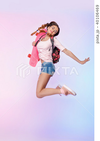 beautiful woman with skate in studio beautiful woman with skate in studio 40106469