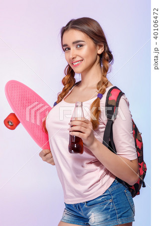 beautiful woman with skate in studio beautiful woman with skate in studio 40106472