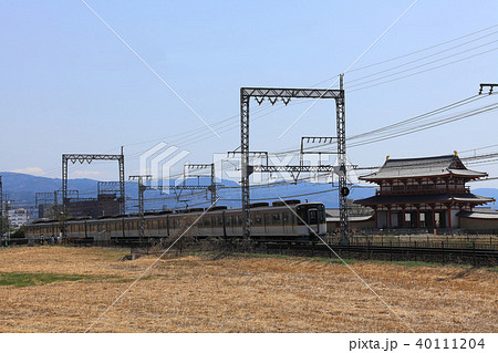 平城京朱雀門と近鉄5820系快速急行 40111204