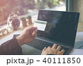businessman hands holding credit card on computer 40111850